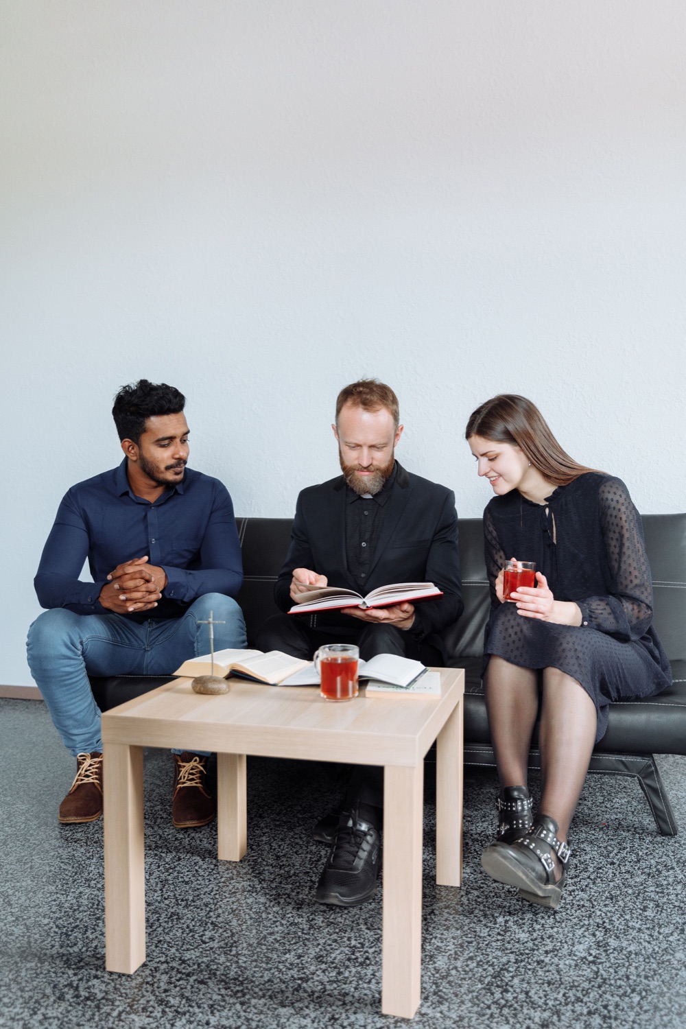 Three church planters studying Scripture together